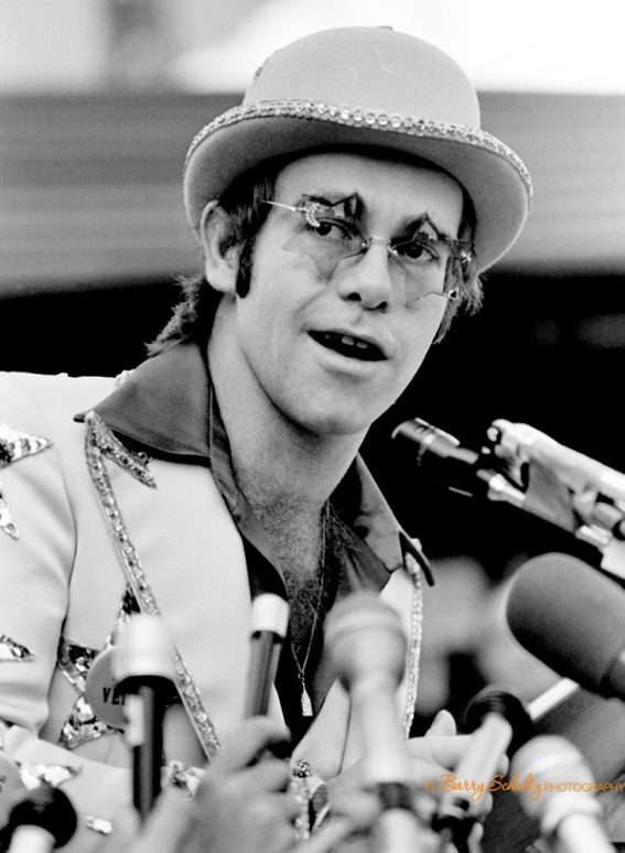 elton john, barry schultz, classic rock photography, rock photographer, iconic rock and roll, fine art, print photography, your song, live, posed, costume, candle in the wind, tiny dancer, rocket man, bennie and the hets, saturday nights alright for fighting