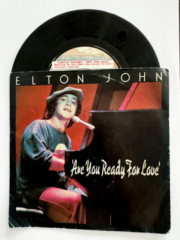 Elton John "Are You Ready For Love" vinyl record jacket featuring photograph of Elton John taken by Barry Schultz.