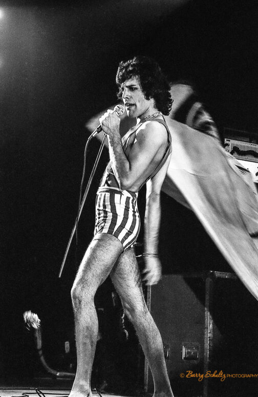 queen, barry schultz, freddie mercury, brian may, bohemian rhapsody, we will rock you, we are the champions, another one bites the dust, roger taylor, john deacon, red special, don't stop me now