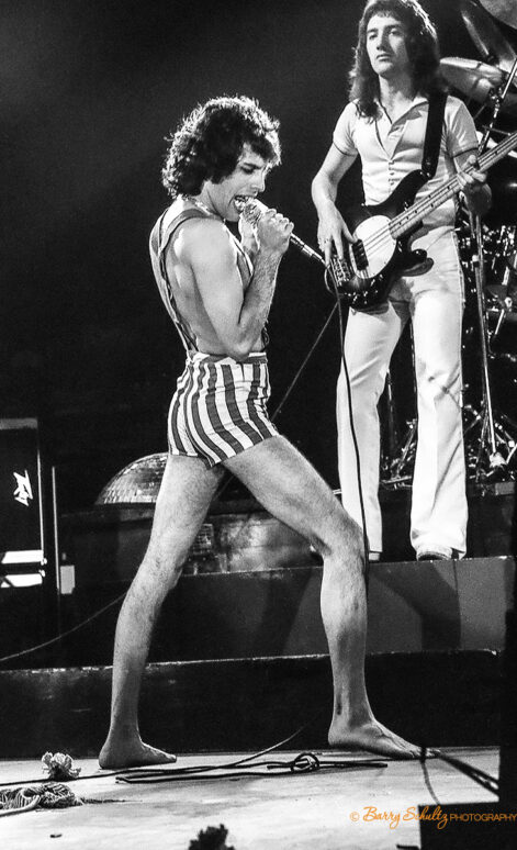 queen, barry schultz, freddie mercury, brian may, bohemian rhapsody, we will rock you, we are the champions, another one bites the dust, roger taylor, john deacon, red special, don't stop me now