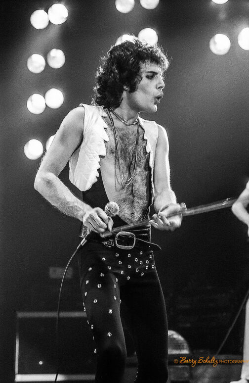 queen, barry schultz, freddie mercury, brian may, bohemian rhapsody, we will rock you, we are the champions, another one bites the dust, roger taylor, john deacon, red special, don't stop me now